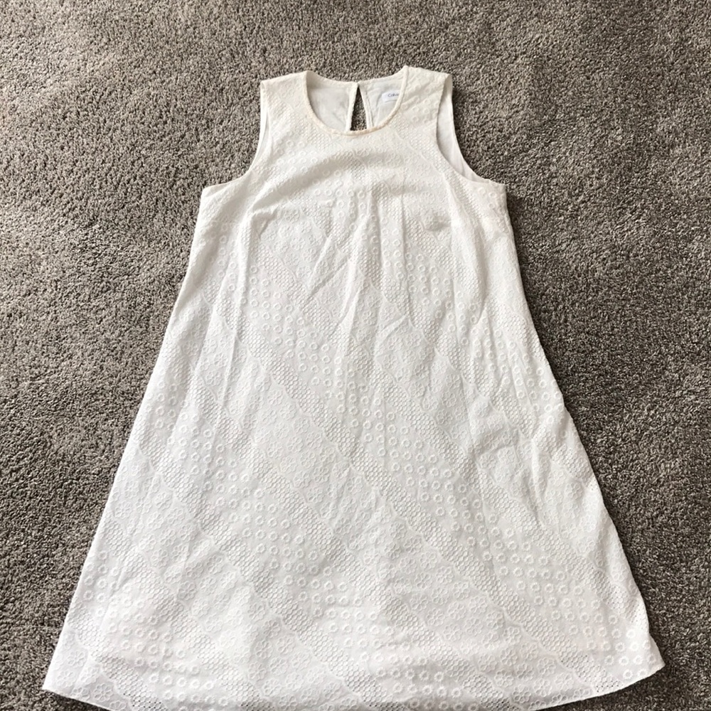 Calvin Kline white sleeveless dress.